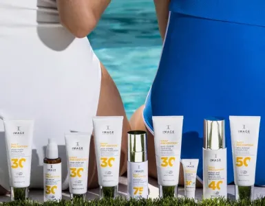 Woman receiving a calming facial mask in a professional spa environment.